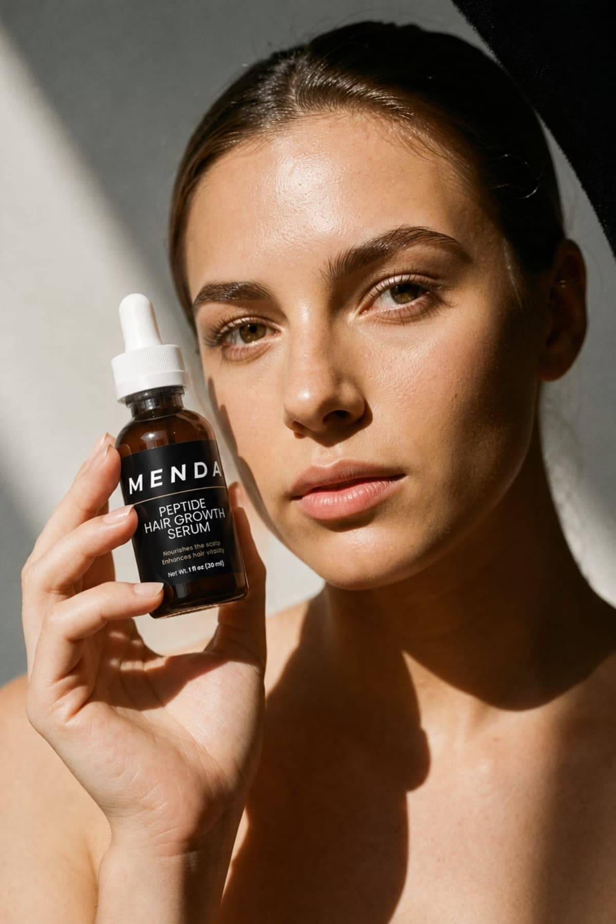 A Menda serum held in morning light